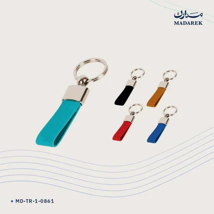 ميدالية مفاتيح — معدن · جلد