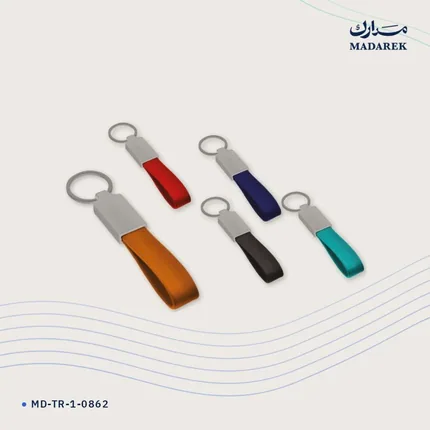 ميدالية مفاتيح — معدن · جلد